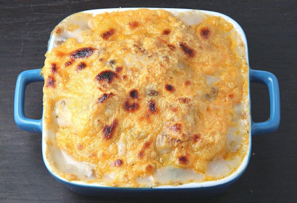 треска под сырной шубкой с овощами